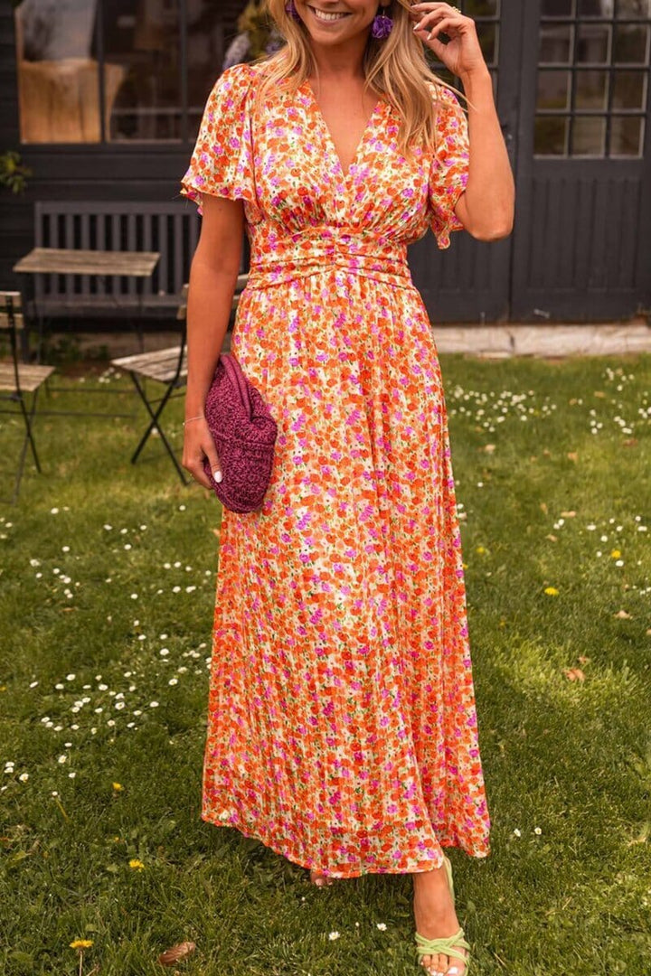 Elegant floral maxi dress for women, perfect for wedding guests & special occasions.