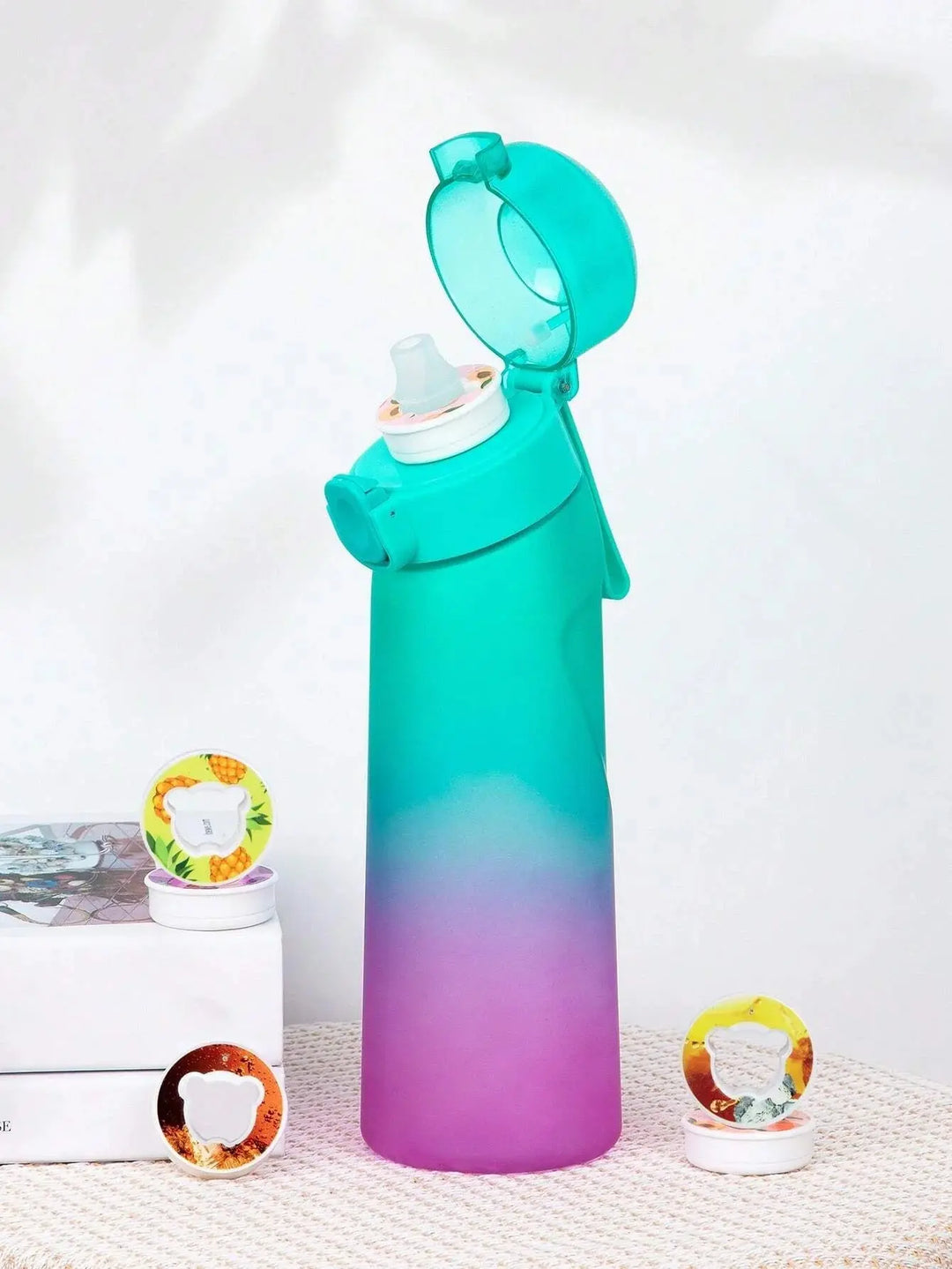 Sleek 0.65L water bottle with scent pods. Great for flavored water, healthy hydration, and on-the-go.