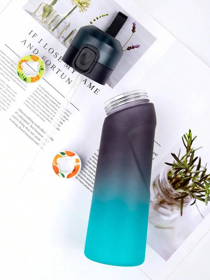 Portable 0.65L scented water bottle with scent pods. Experience flavored water without added sugar.