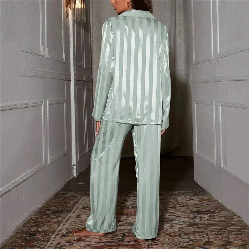 Luxurious silky pajamas for women. Soft two-piece nightwear set, ideal for comfort and relaxation.