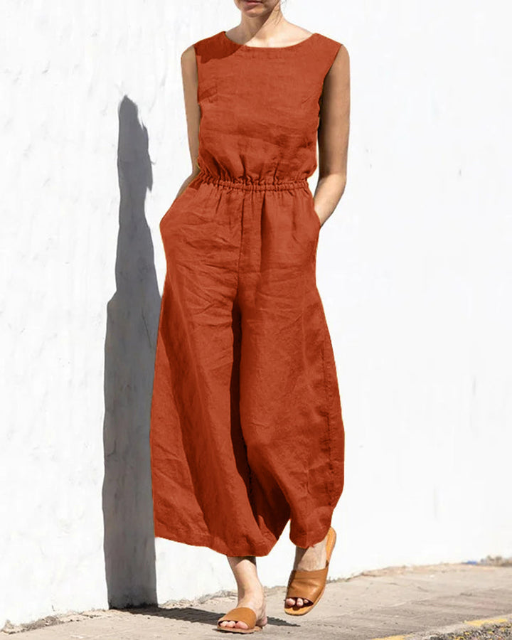 Chic women's sleeveless wide leg jumpsuit, an elegant one-piece for versatile summer wear. Stylish.