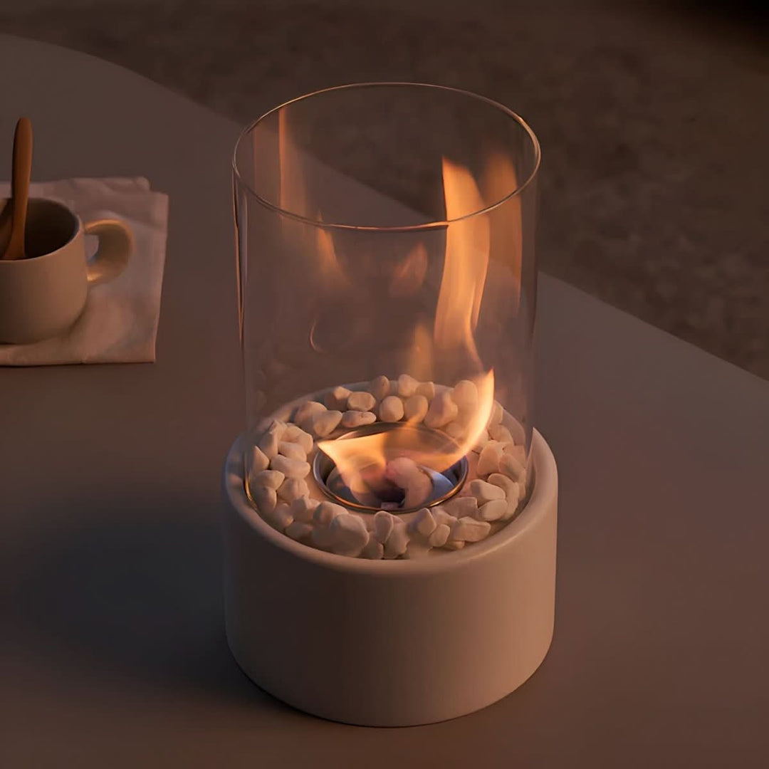 White modern tabletop fireplace with a smokeless bioethanol flame, perfect for cozy indoor & outdoor decor.