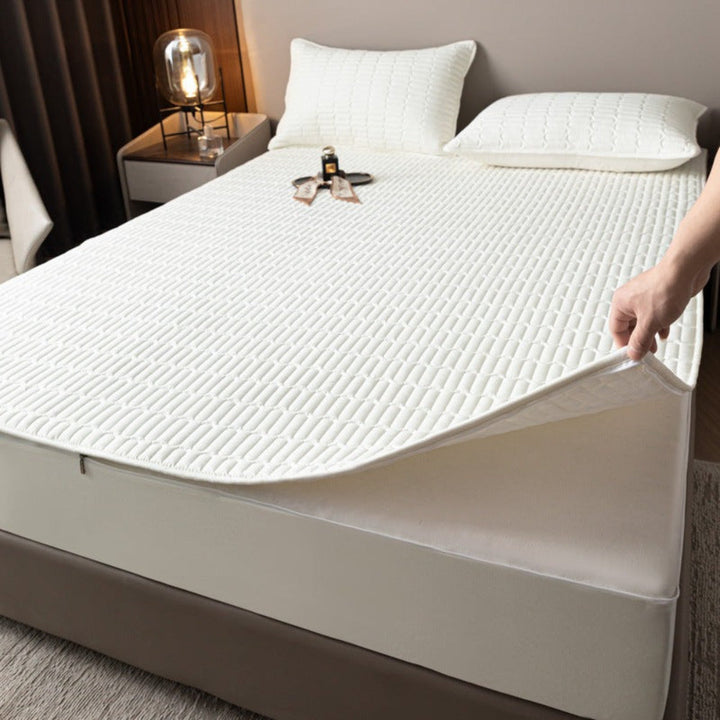 Machine washable waterproof mattress protector with antibacterial full enclosure. Ensures superior sleep hygiene.