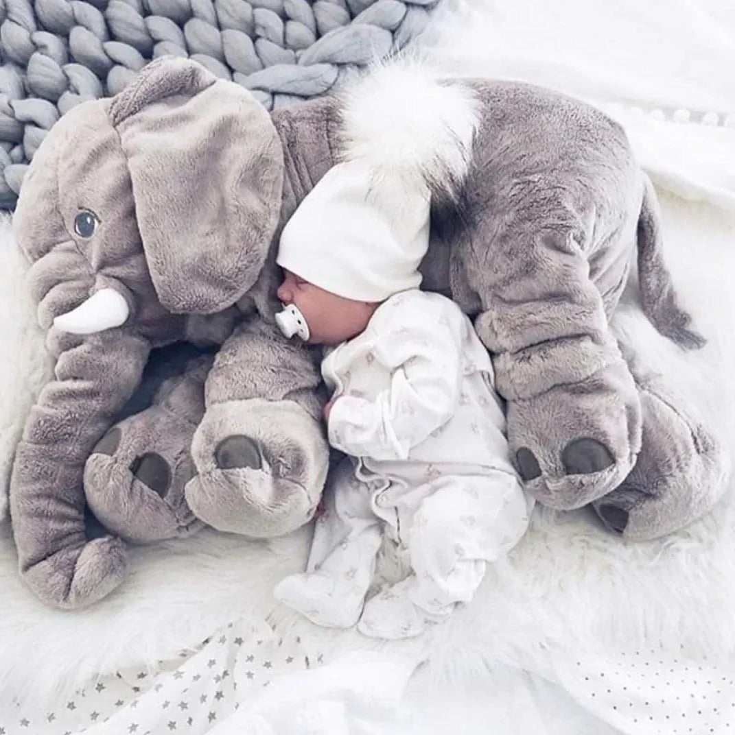 Comforting baby elephant plush toy, a soft cuddle pillow designed for toddlers, babies, & kids' snuggles.