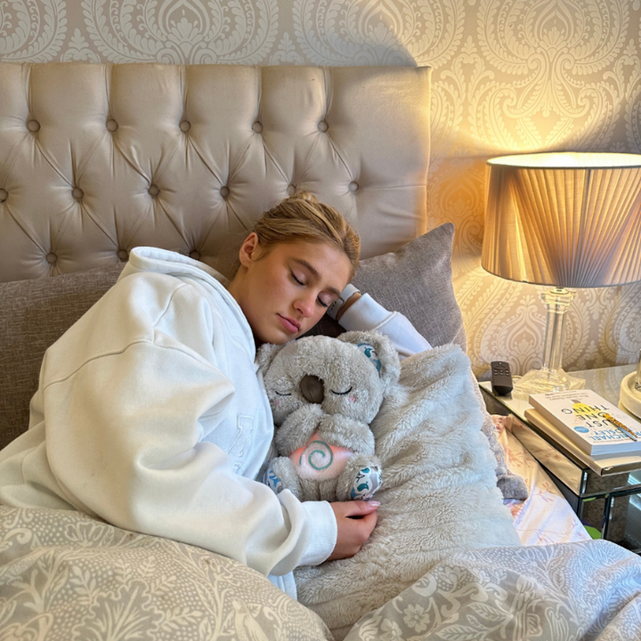 Plush calming animal toy designed for stress relief & comfort. Soft cuddle buddy, an effective unisex anxiety aid.