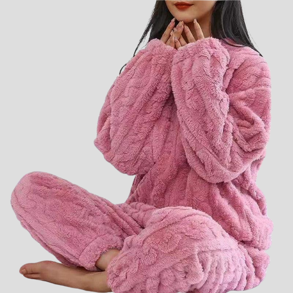 Warm and soft women's fleece pajama set. Plush sleepwear for a cozy night's rest or relaxed loungewear.
