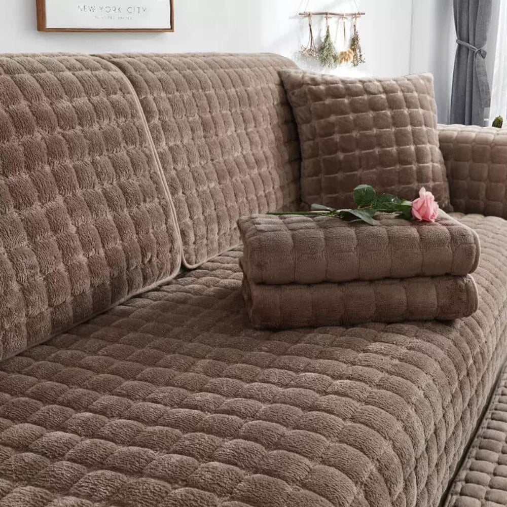 Pet-friendly, scratch-resistant flannel couch protector for dogs & cats, featuring an anti-slip backing.