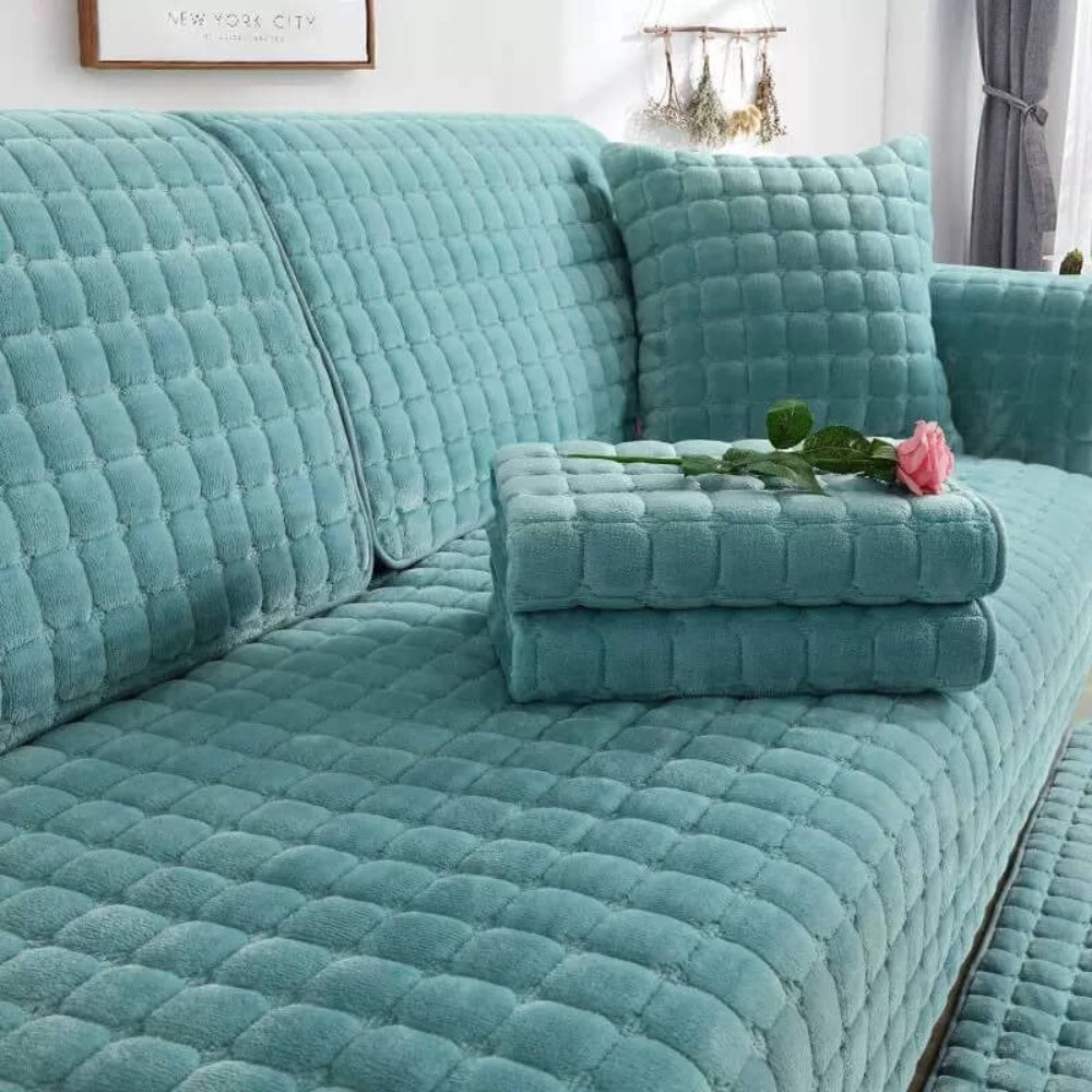 Stylish universal flannel sofa protector enhancing home decor, providing comfort and furniture protection.