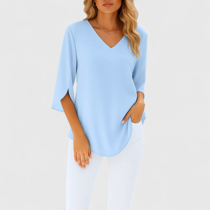 Sophisticated women's V-neck blouse, an elegant and versatile top for modern women, perfect for day to night style.
