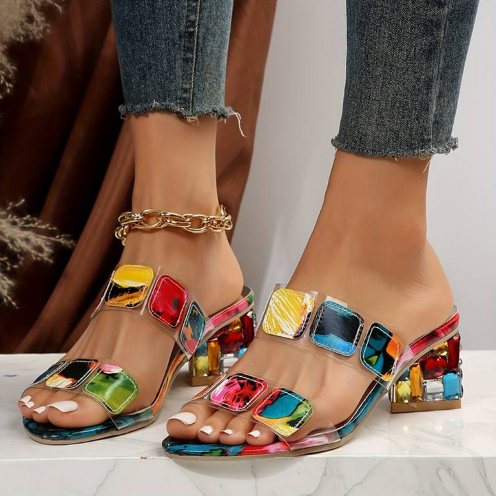 Marielle women's ergonomic comfort sandals. Features sparkling glitter straps & open toe design for summer elegance.