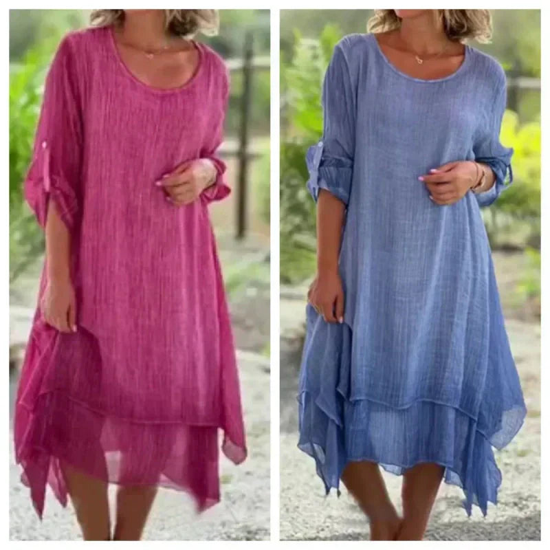 Casual women's layered midi dress with 3/4 sleeves, providing comfort & style with its modern asymmetric hem.
