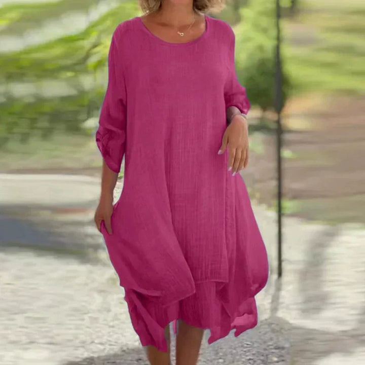 Women's layered midi dress with 3/4 sleeves, flowy design & comfortable fit, perfect for casual summer style.