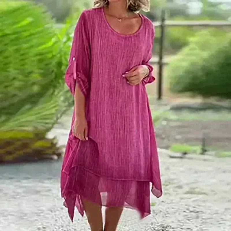 Stylish blue layered midi dress for women with 3/4 sleeves, a comfortable fit, and effortless summer style.