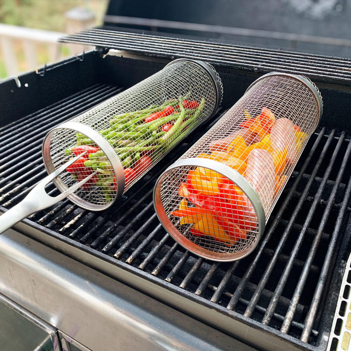 "Stainless steel BBQ grill basket with rotating design for even grilling of veggies and meats, enhancing cooking flavors."