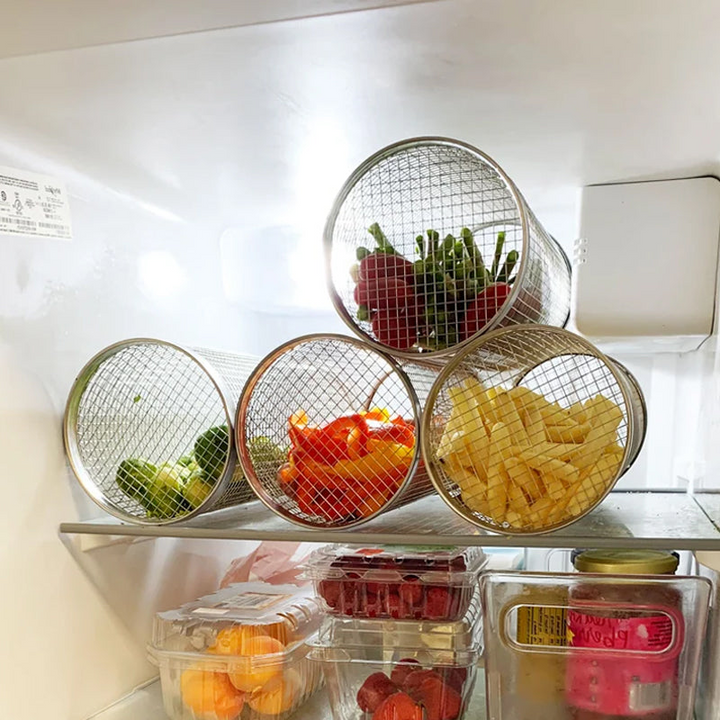 "Stainless steel BBQ grill basket with rotating design for even grilling of veggies and meats, enhancing cooking flavors."