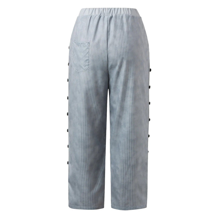 Fashionable striped high-waist women's trousers, featuring decorative buttons for a refined, office-ready style.