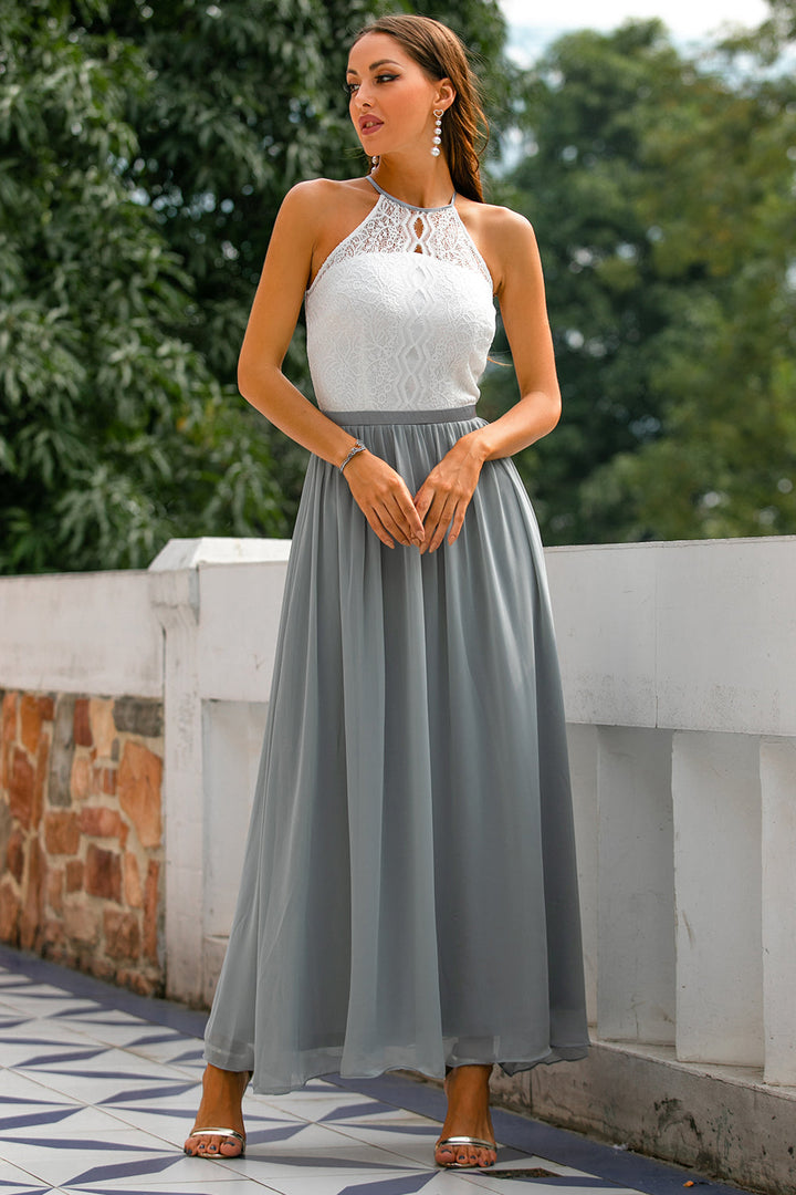 Stunning women's halter wedding guest maxi dress. Elegant floor-length formal gown for a chic special occasion look.