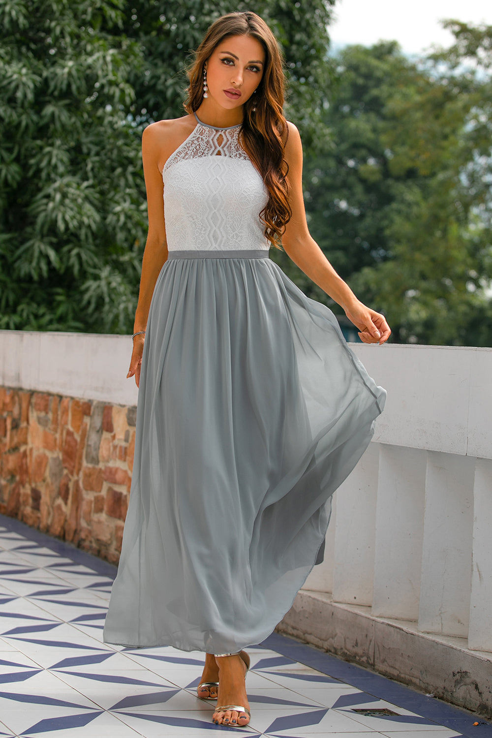 Elegant women's halter wedding guest maxi dress. Chic floor-length formal gown perfect for special occasions.