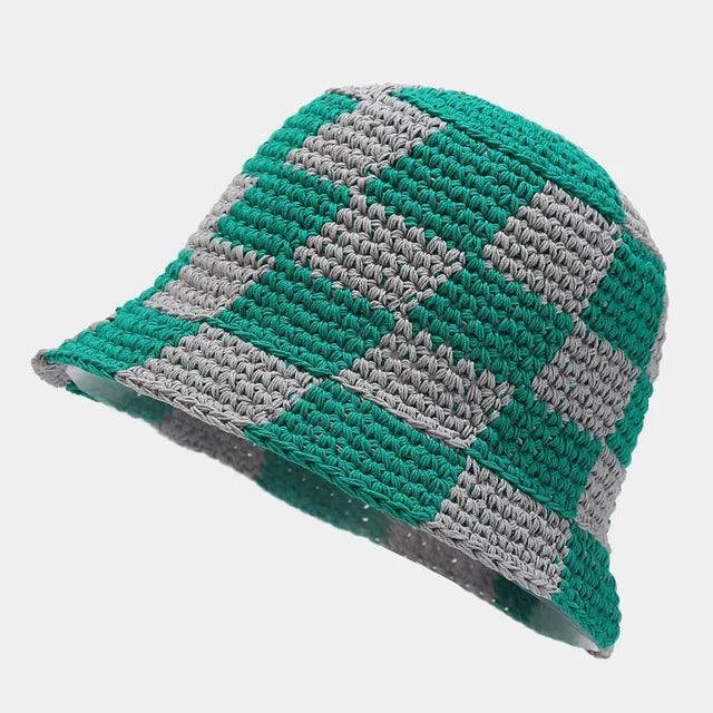 Women's breathable checkered crochet fisherman sun hat. Ideal for beach days, travel, and stylish summer looks.