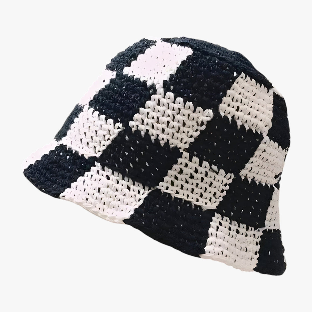 Close-up of a women's checkered crochet bucket hat, highlighting its unique texture & stylish design.