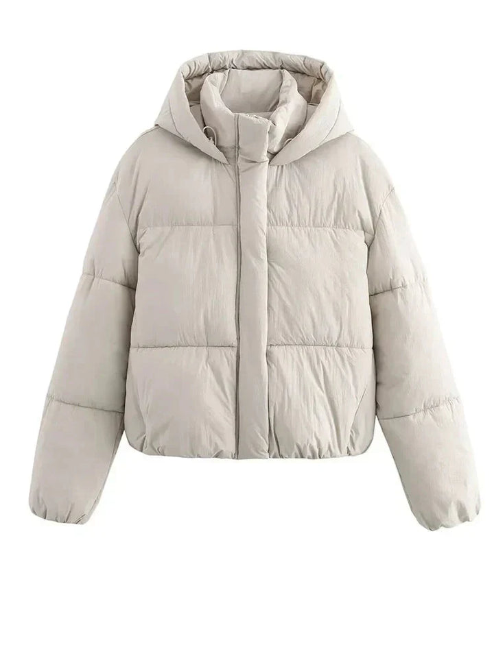 Casual women's cropped puffer jacket, insulated for warmth, shown in a vibrant color, ideal outerwear