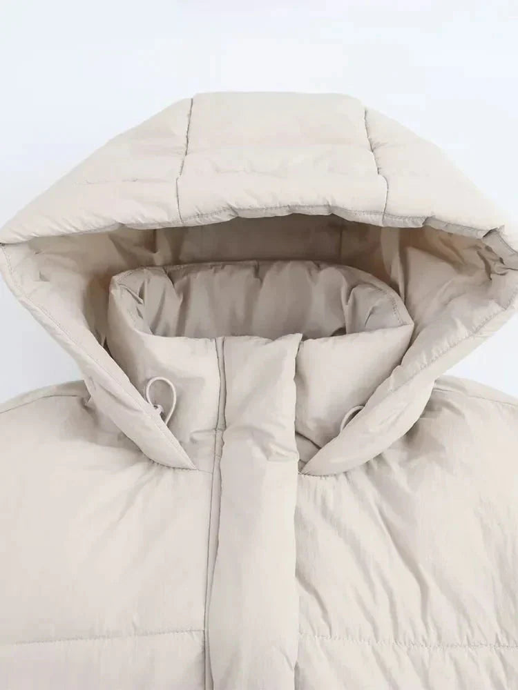 Fashionable women's cropped puffer jacket, insulated and waterproof, great for cold weather