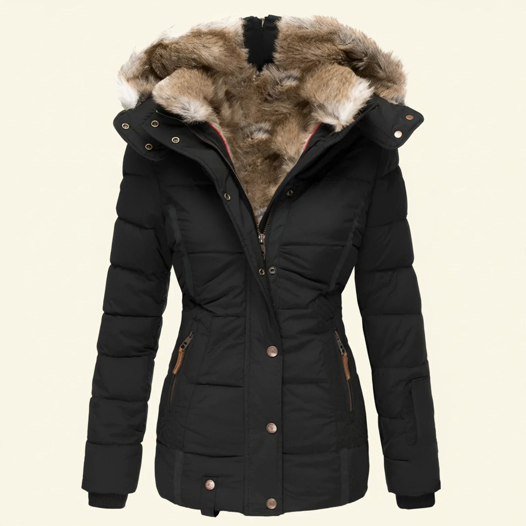 Stylish women's hooded winter puffer jacket, perfect for warmth & comfort in cold weather.