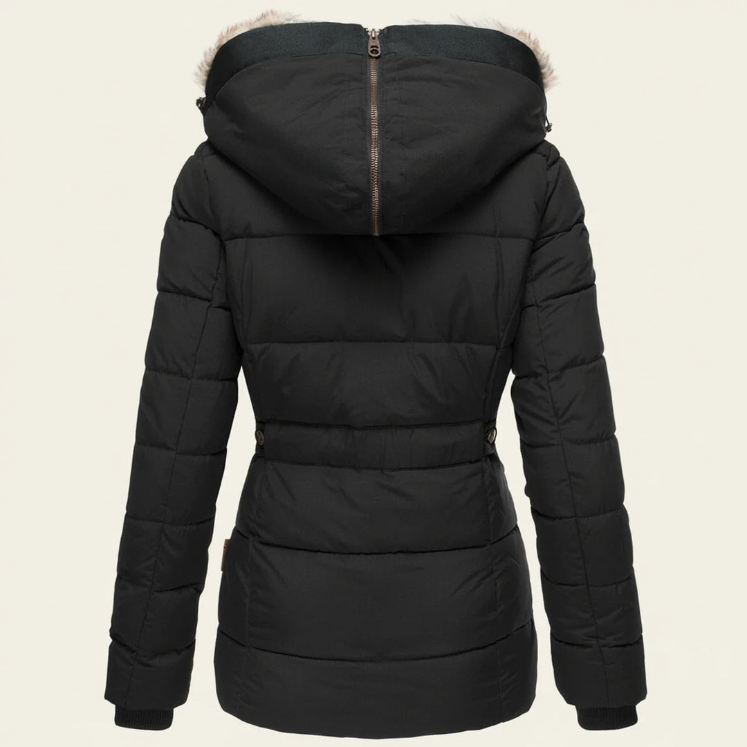 Women's hooded winter puffer jacket with faux fur trim, designed for cold weather style & warmth.