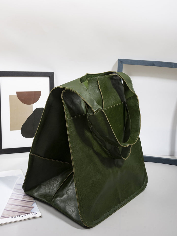 Durable women's oversized shoulder bag, featuring a sturdy design & large capacity for a versatile everyday tote.