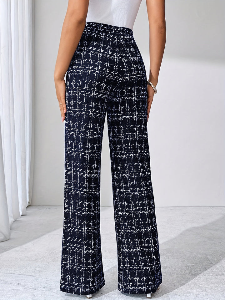 Women's high-waisted knit plaid pants with a stylish flare leg, soft and stretchy.