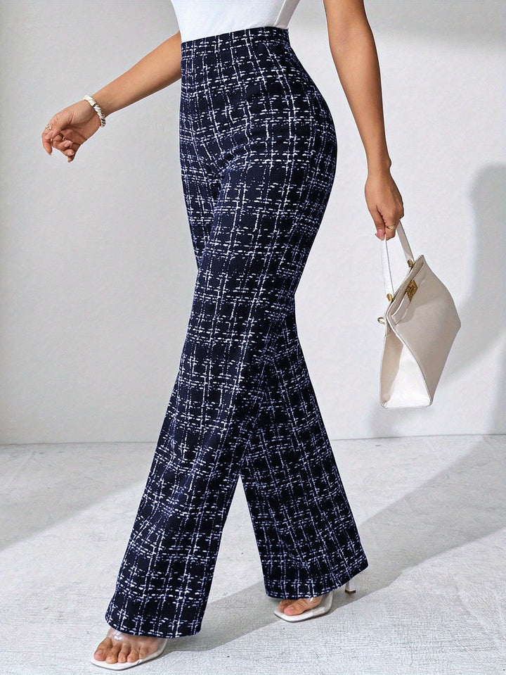 Detail shot of the knit fabric and plaid design on women's comfortable flare pants.