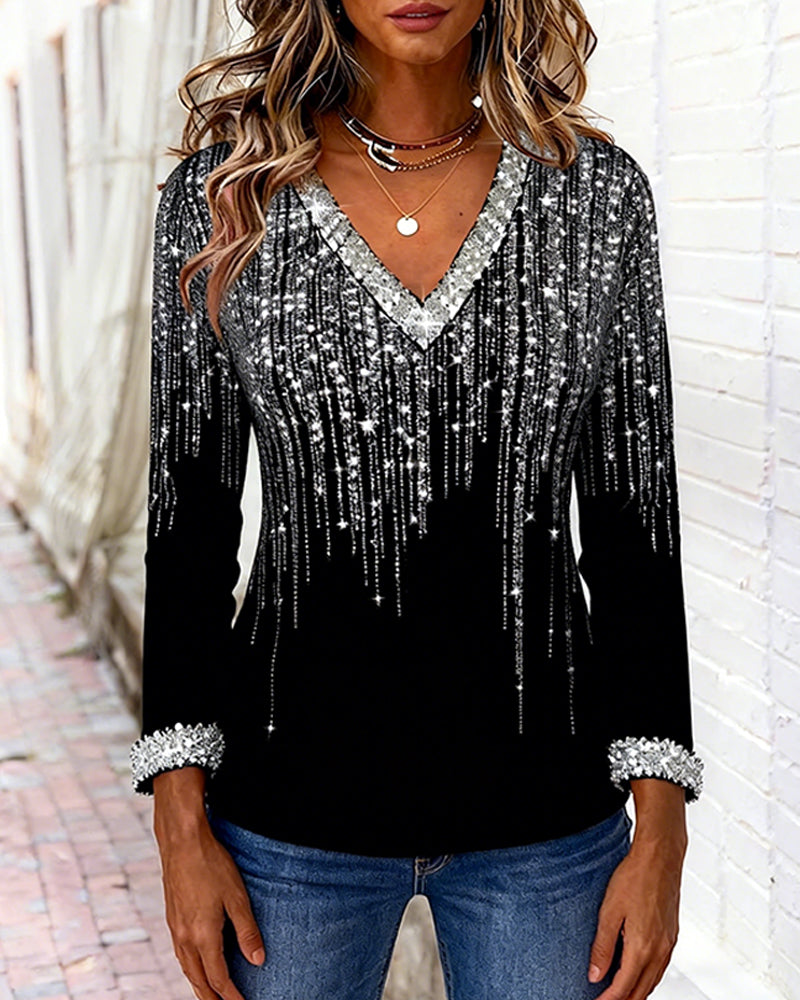 Elegant women's V-neck long sleeve top with a vibrant print. Great for stylish everyday fashion.