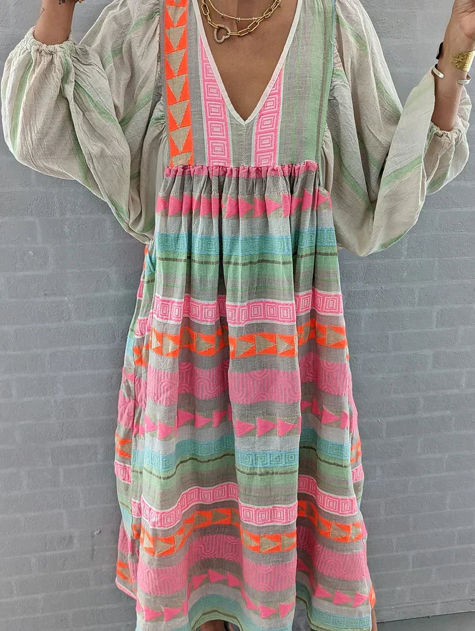 Colorful gradient women's summer maxi dress. Vibrant hues, flowy silhouette, perfect for a chic vacation look.
