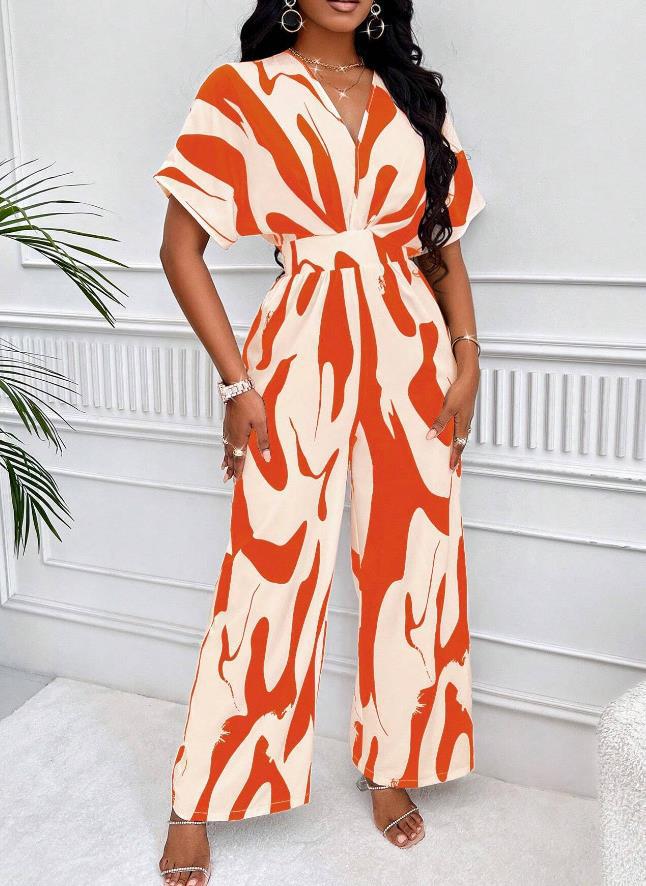 Stylish women's printed V-neck jumpsuit. Relaxed fit, short sleeve design, ideal for summer fashion & vacation.
