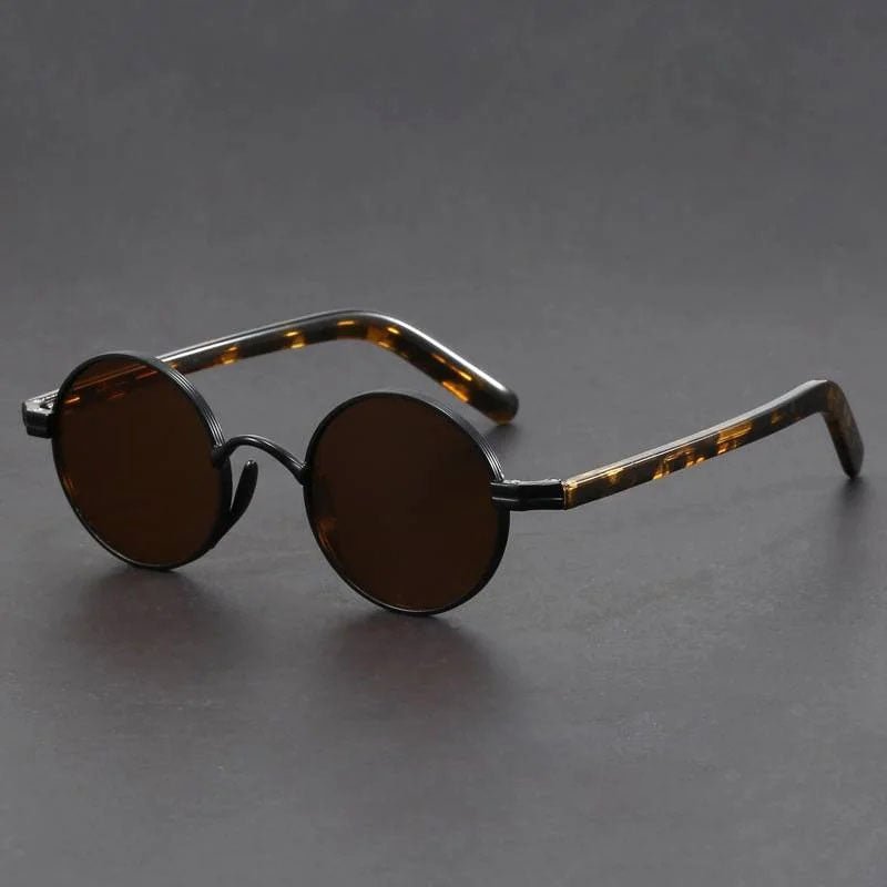 Tortoiseshell retro round sunglasses. Unisex vintage eyewear with UV400 protection & comfortable fit.