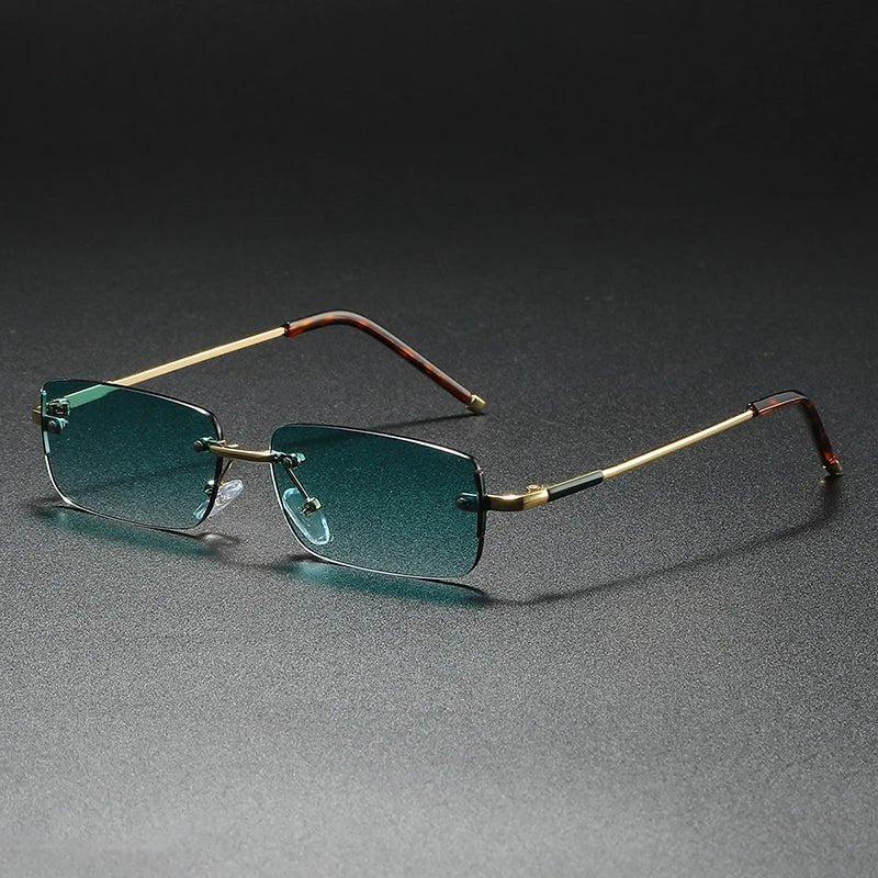 Unisex rimless rectangular sunglasses with gold accents & stylish gradient lenses. Modern UV protection eyewear.