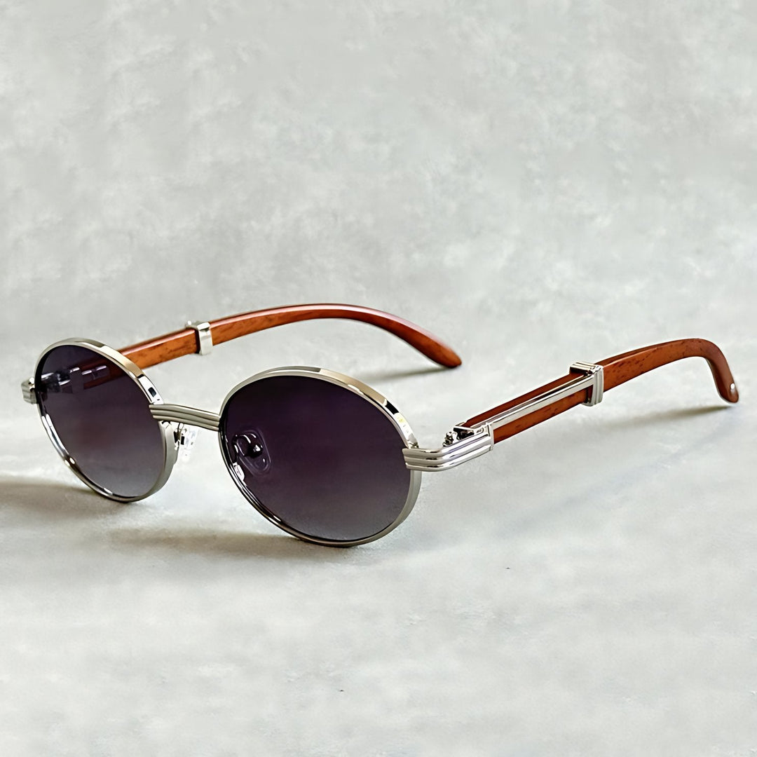 Stylish designer unisex round gold frame sunglasses, a luxury fashion accessory.