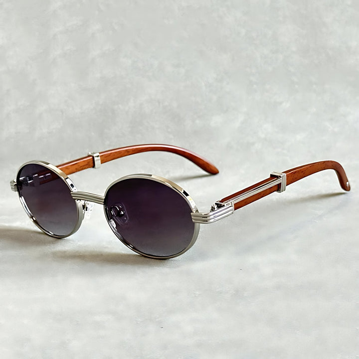 Stylish designer unisex round gold frame sunglasses, a luxury fashion accessory.