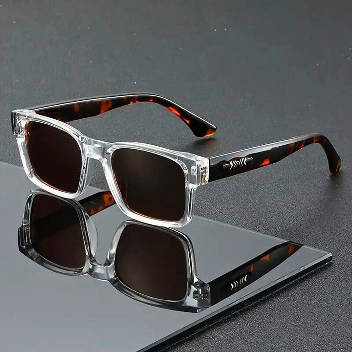 Fashion-forward square frame eyewear. These unisex sunglasses feature UV400 protection and sleek design.