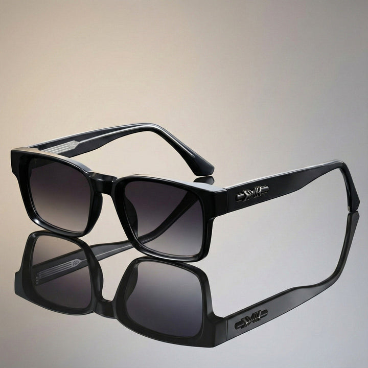 Close-up of elegant unisex square frame sunglasses, featuring anti-reflective lenses & UV400 protection.