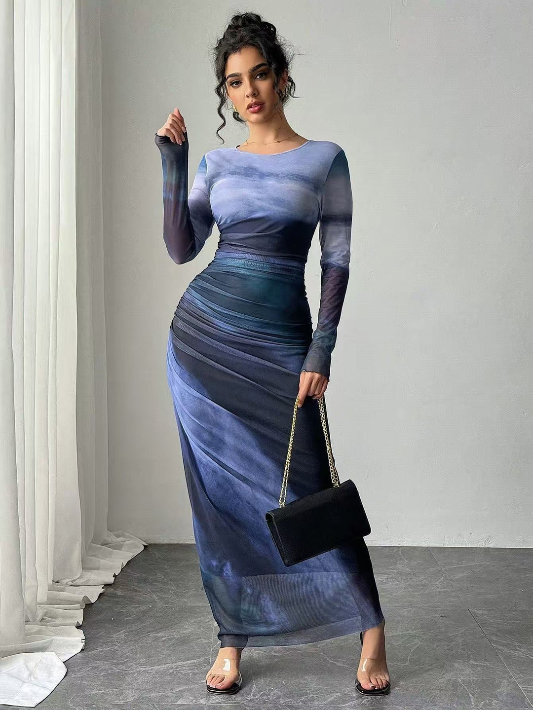 Elegant women's long sleeve bodycon maxi dress, ideal for parties, evening events & date nights.
