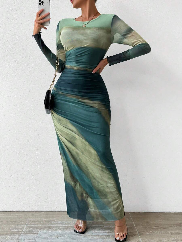 Women's elegant long sleeve bodycon maxi dress, perfect for evening wear & special occasions.
