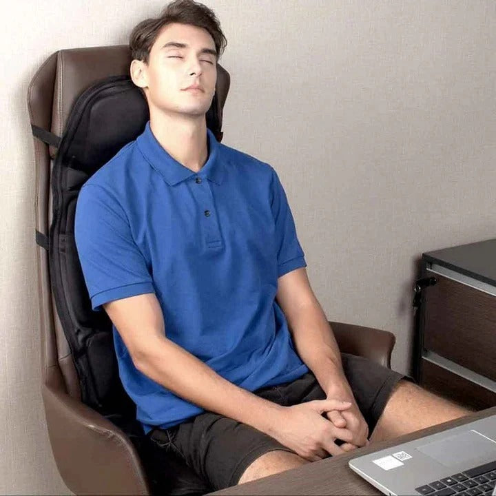 Heated massage cushion for back, neck, shoulder muscle tension relief. Improves wellness with versatile modes.