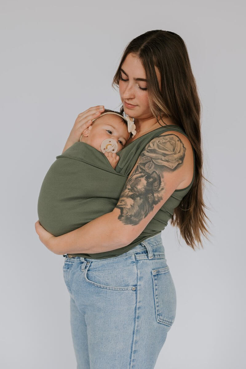 Lightweight breathable mesh baby carrier, designed for ergonomic comfort and coolness for parent and child.
