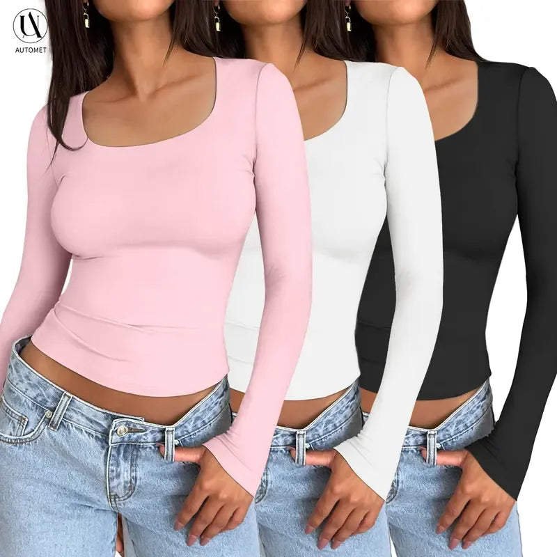 Three women's ribbed knit long sleeve scoop neck tops in black, white, and gray, made from stretch cotton blend fabric.