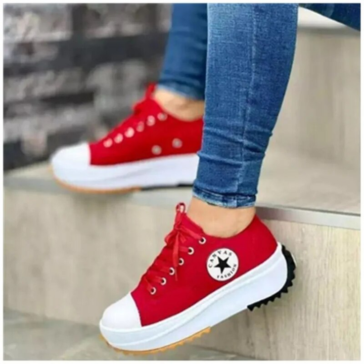 Stylish women's chunky sole sneakers complementing a casual outfit, providing trendy fashion and comfort.