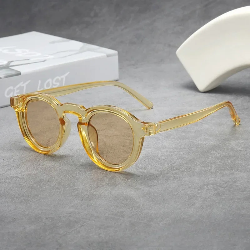 Tortoise round tinted sunglasses offering classic unisex style & comfort. Perfect daily eyewear.