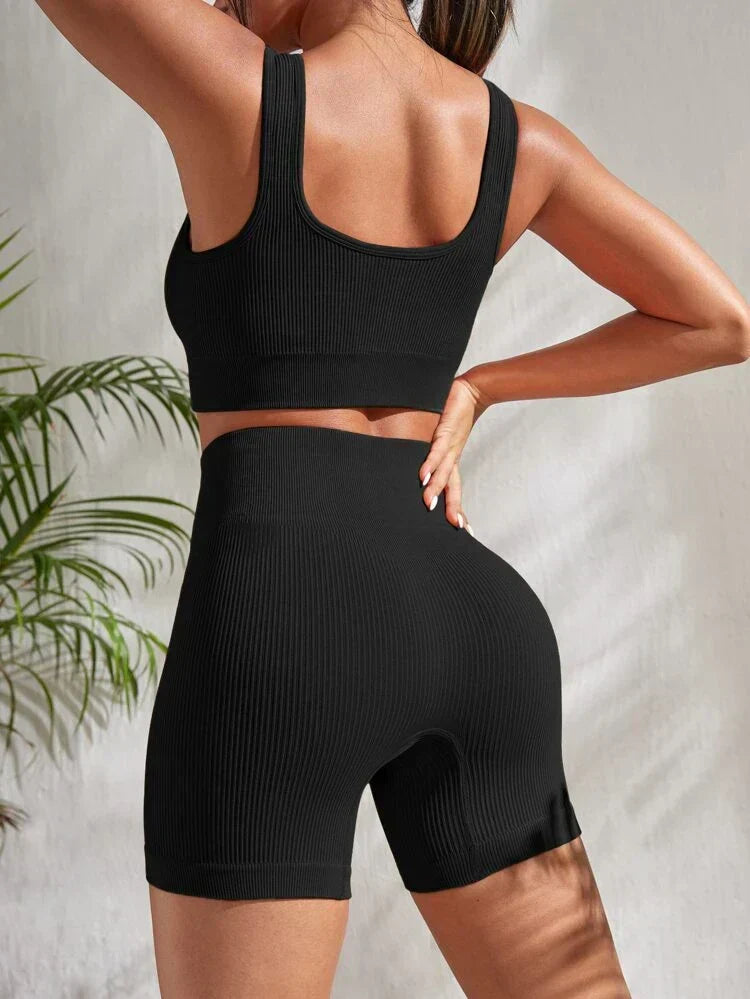 Sienna women's workout set featuring high-waist fitness shorts and a supportive athletic sports top.