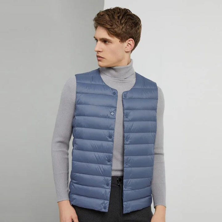 Transitional men's ultralight vest, perfect for layering, providing warmth without bulk.