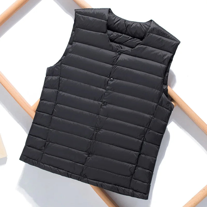 Men's lightweight down vest, designed for ultimate freedom and warmth in any season.